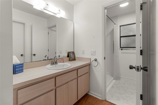 bathroom with vanity and curtained shower