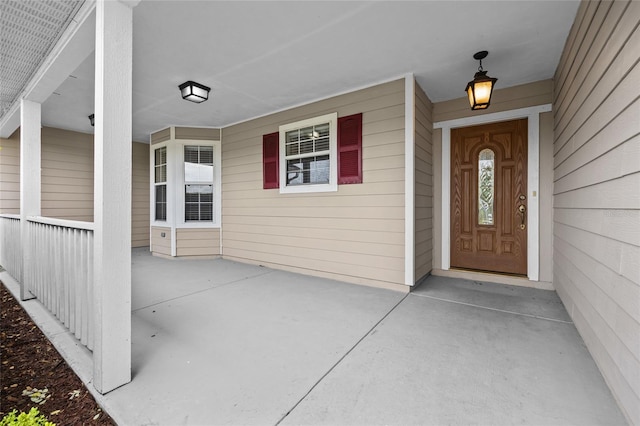 entrance to property with covered porch