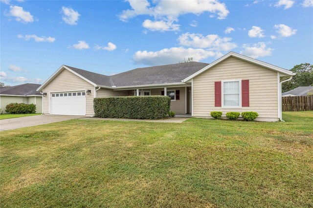 single story home with a front lawn and a garage