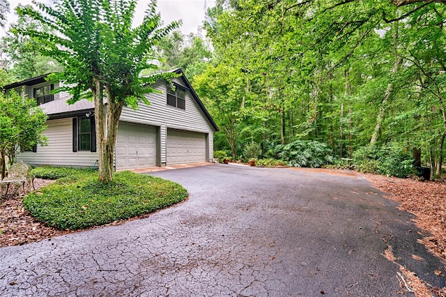 view of home's exterior with a garage