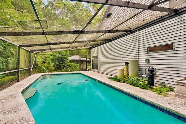 view of pool featuring a lanai