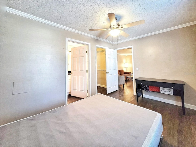 bedroom featuring ceiling fan, crown molding, and a textured ceiling