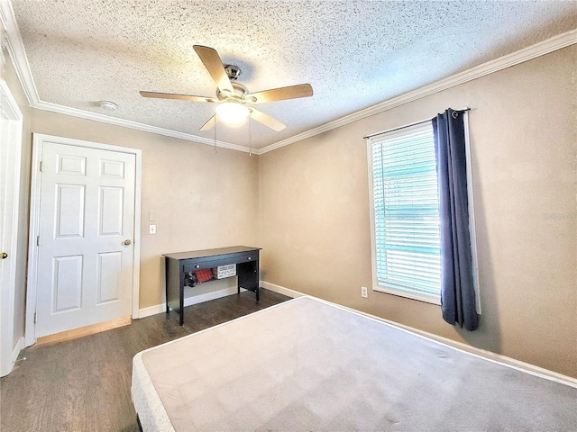 bedroom with ceiling fan, dark hardwood / wood-style flooring, crown molding, and a textured ceiling