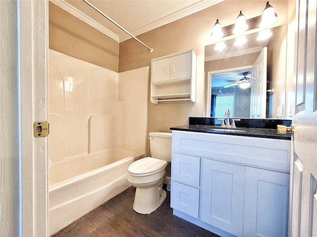 full bathroom with hardwood / wood-style floors, vanity, washtub / shower combination, ceiling fan, and a textured ceiling