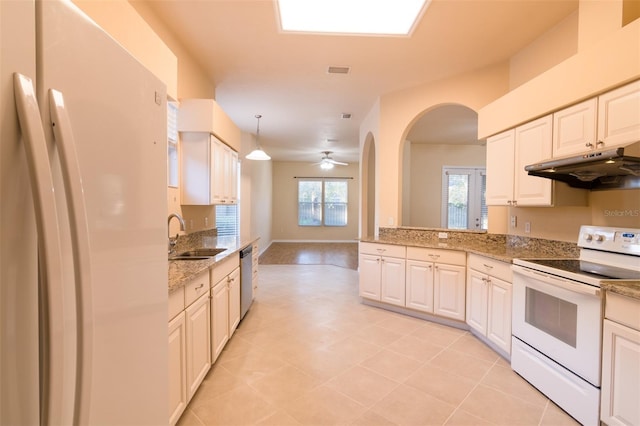 kitchen with pendant lighting, white cabinetry, white appliances, and sink