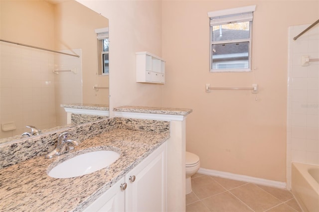 full bathroom with tile patterned flooring, vanity, toilet, and tiled shower / bath combo