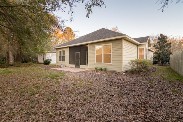 rear view of house featuring a patio area