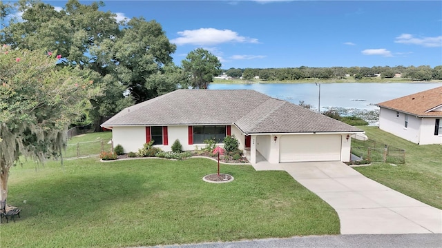 single story home featuring fence, concrete driveway, a front yard, stucco siding, and an attached garage