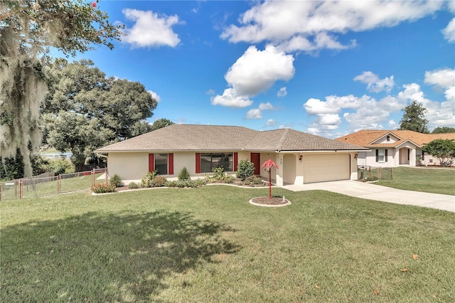 ranch-style house with a front yard, fence, driveway, an attached garage, and stucco siding