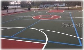 view of basketball court with community basketball court