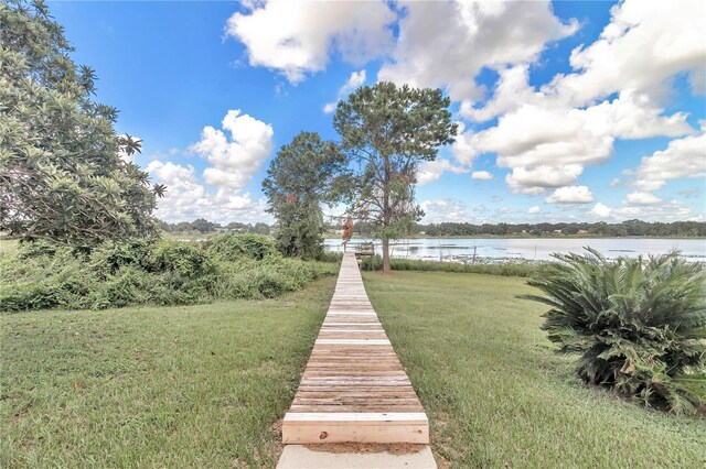 exterior space with a water view