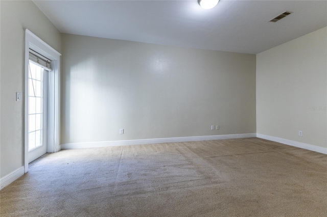 view of carpeted spare room