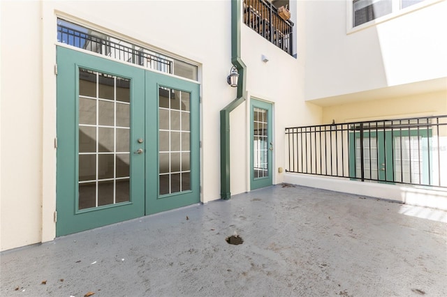 doorway to property with french doors and a patio area