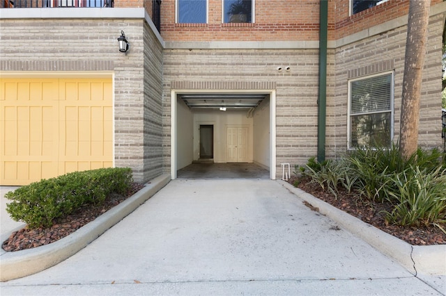 doorway to property featuring a garage