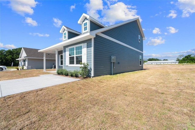 view of home's exterior featuring a lawn