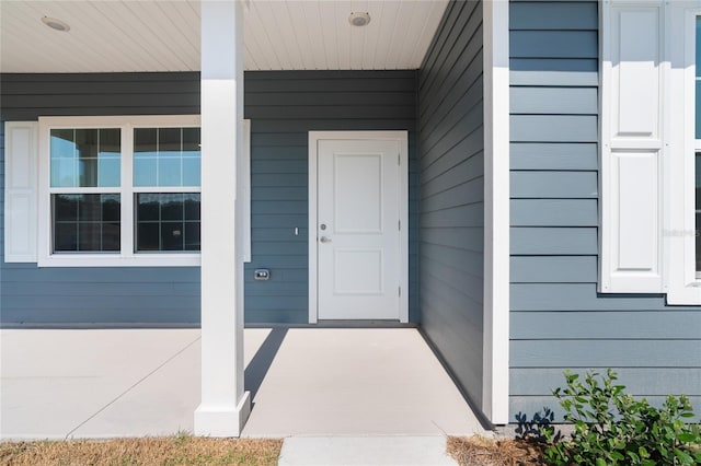 entrance to property with a porch