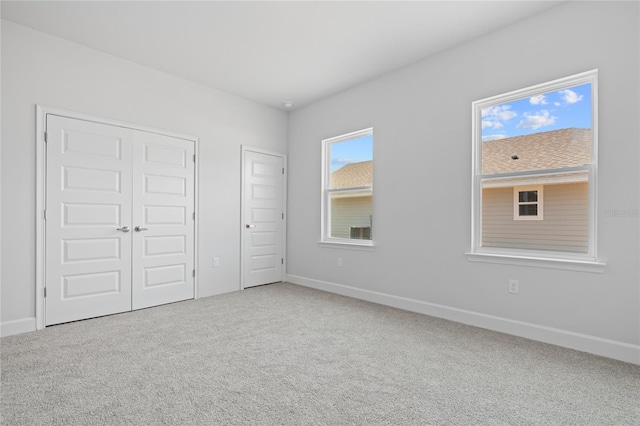 unfurnished bedroom with carpet