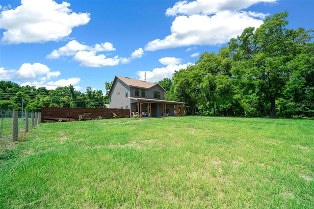 view of yard with fence