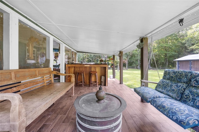 view of patio / terrace featuring an outdoor living space and a bar