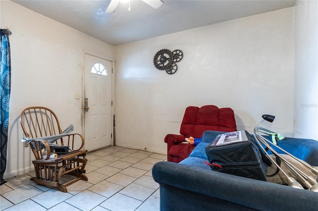 interior space with ceiling fan and light tile patterned flooring