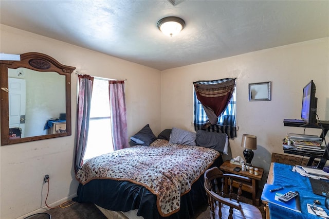 bedroom featuring carpet