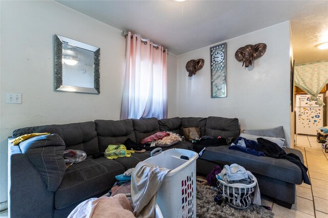 living room with light tile patterned floors