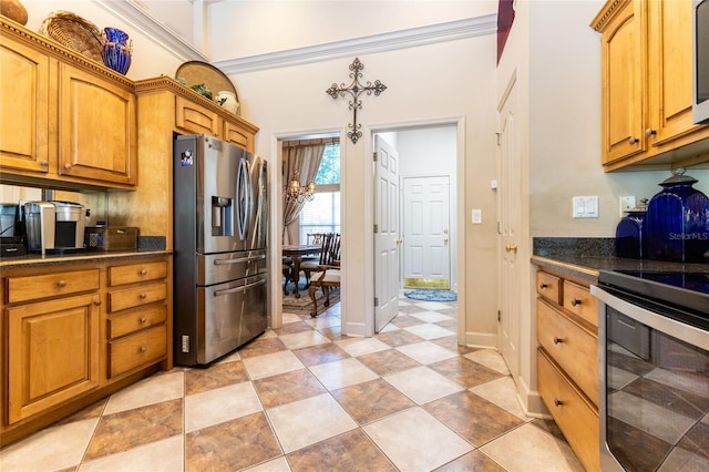 kitchen featuring crown molding and appliances with stainless steel finishes