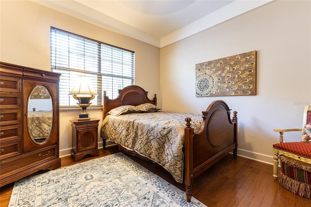 bedroom featuring dark hardwood / wood-style floors