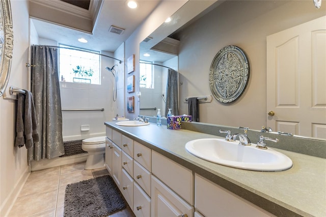 full bathroom featuring shower / bath combo, tile patterned floors, ornamental molding, vanity, and toilet