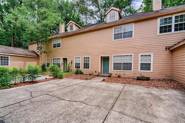 view of front of property featuring a patio area