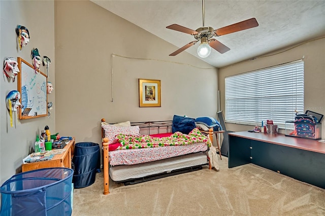 carpeted bedroom featuring ceiling fan and lofted ceiling