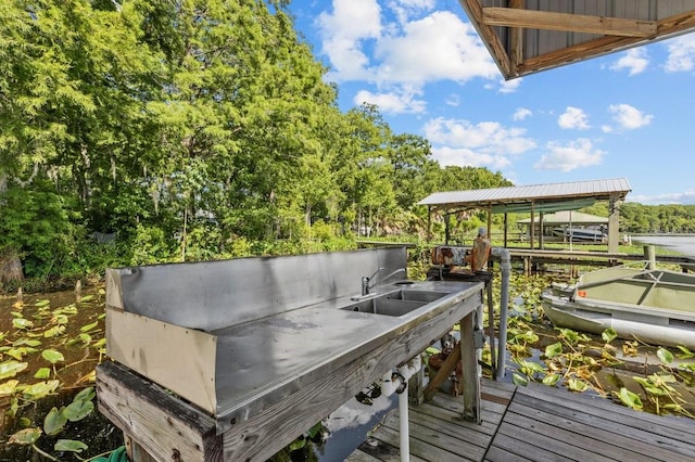 wooden deck featuring a boat dock