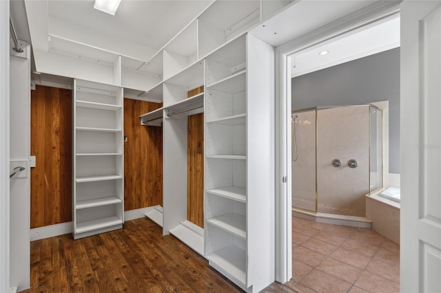 spacious closet with wood-type flooring