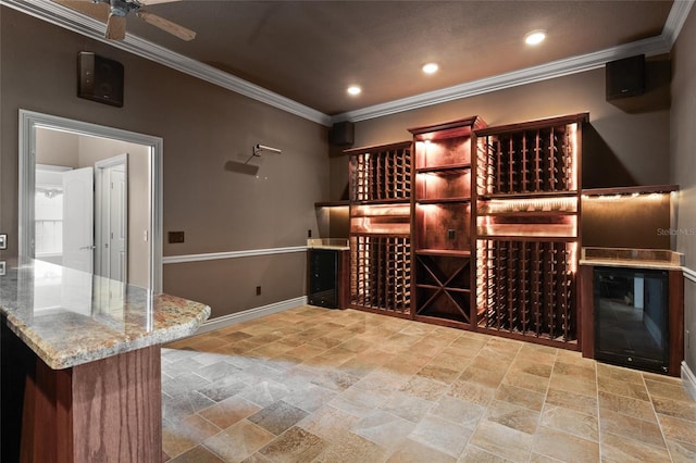 wine area with ornamental molding