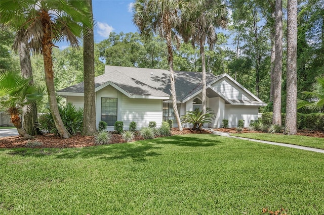 ranch-style home with a front yard