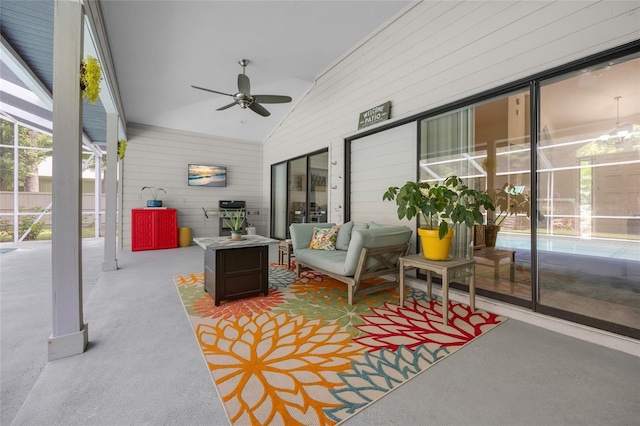 view of patio featuring an outdoor living space, area for grilling, and ceiling fan