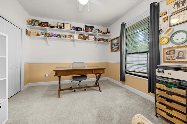 office featuring ceiling fan and light colored carpet