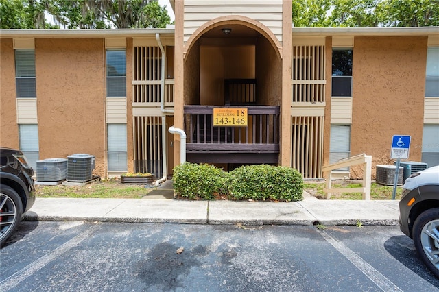 view of property featuring cooling unit