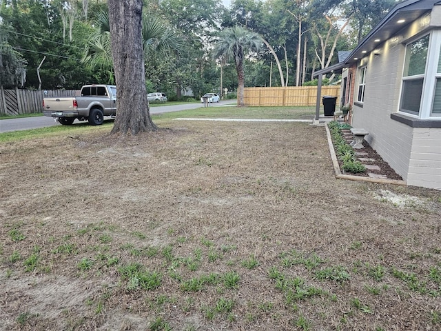 view of yard with fence