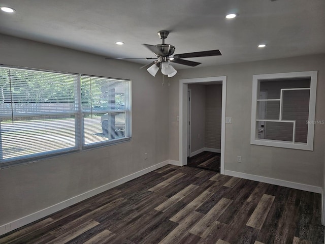 unfurnished room with dark wood finished floors, recessed lighting, baseboards, and ceiling fan