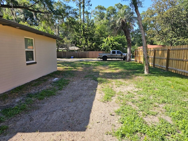 view of yard featuring fence