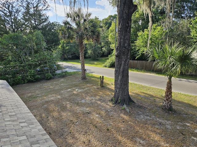 view of yard featuring fence