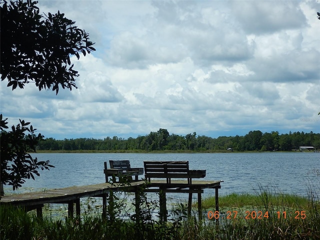 view of dock with a water view