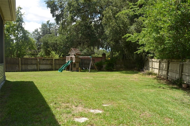 view of yard with a playground