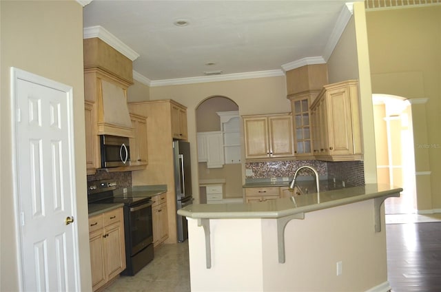 kitchen with light hardwood / wood-style floors, stainless steel appliances, ornamental molding, a breakfast bar, and backsplash