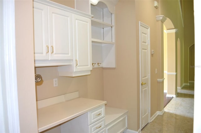 interior space with light tile patterned floors