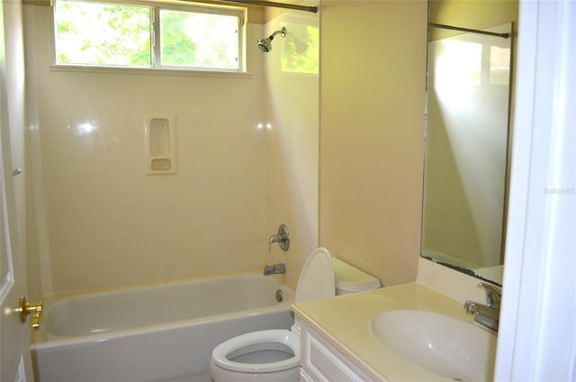 full bathroom with shower / bathing tub combination, toilet, and vanity