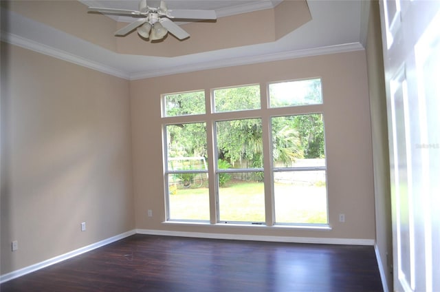 empty room featuring dark hardwood / wood-style floors and a healthy amount of sunlight