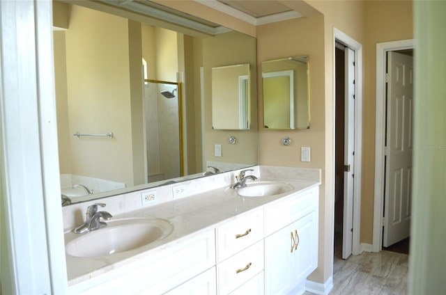 bathroom with dual vanity and crown molding