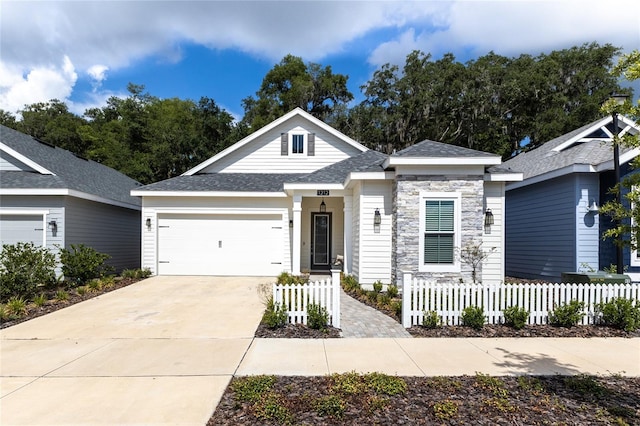 view of front of property with a garage